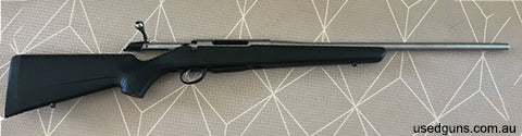 Tikka T3x stainless Original magazine Stainless Less than 40 rounds through it.