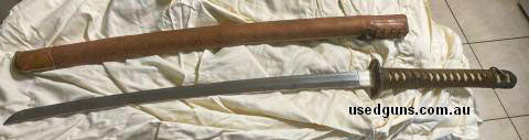 Handmade officer‚Äö√Ñ√¥s sword. Ray handgrip that has been professionally rewrapped at some point. Silver washed hibachi is unusual. Wood scabbard that has been
