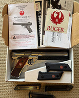 As New - Hardly Used - 3 Magazines - Boxed with all books and instructions - extra grips