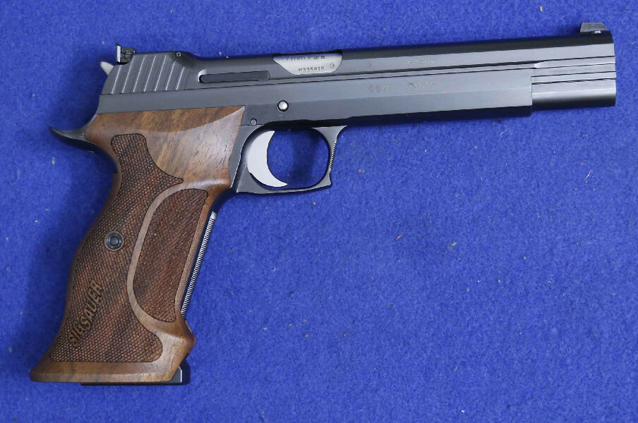 Sig Sauer P210 semi auto 9mm timber grips, blue barrel 145mm 10 shot magazine