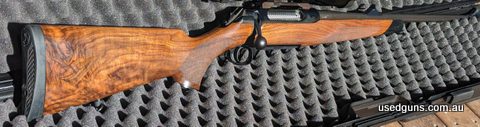 Sauer 404 Elegance would be excellent except for a few minor handling marks. Barrel has had around 120 shots though it and is very accurate. Beautifully figured