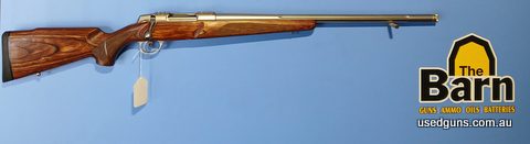 Sako 90 243W Varmint with a birch-laminated stock and a stainless fluted barrel. Is in excellent condition.