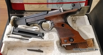 Functions perfectly with any ammo. Comes with Original case (in reasonable condition) 2 mags, extra front sight, original owners manual , guarantee and dated ma