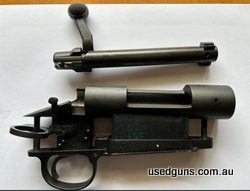 Remington 700 Short Action (SA) action together with barrel (not shown in photo) chambered in 243 Winchester. Purchased for the action only with intention to bu