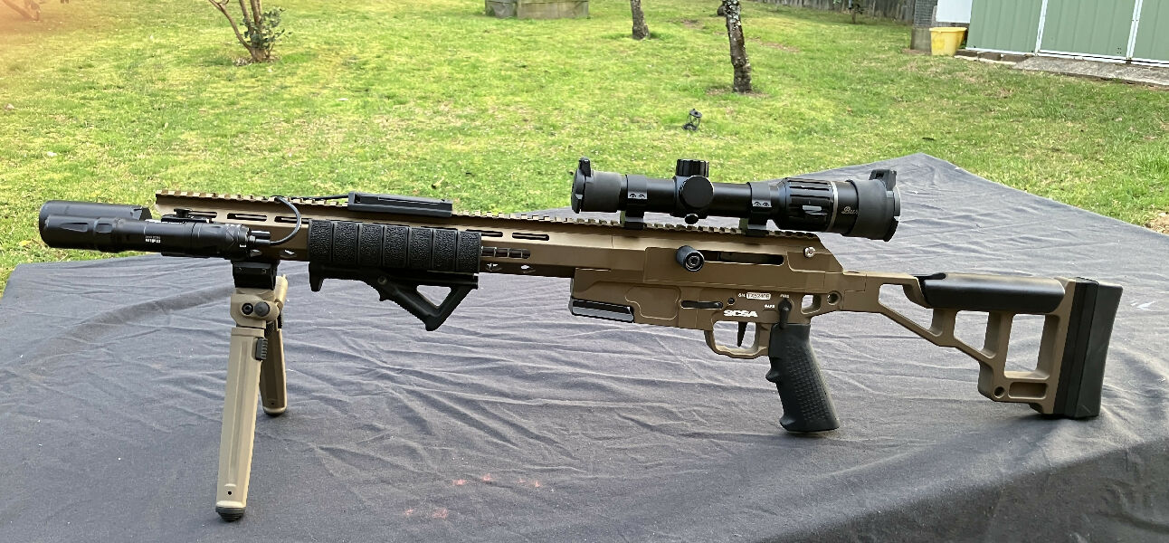 SCSA (Southern Cross Small Arms) straight pull bolt Taipan X in 223 with short 16.5‚Äù barrel. Accessories include: