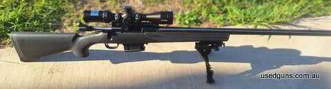 Includes scope/rings/bipod, good shooter, varmint barrel.