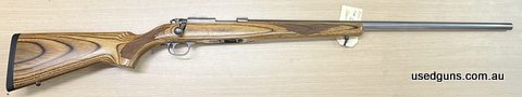 Very nice example of classic stainless laminate rifle, all offers considered
