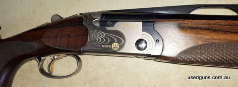 Unmarked as new. Cased with spare parts box and choke box, extra kick pad ,2 sizes of triggers, 3 sights, all correct tools . High rib trap gun in proper Berett