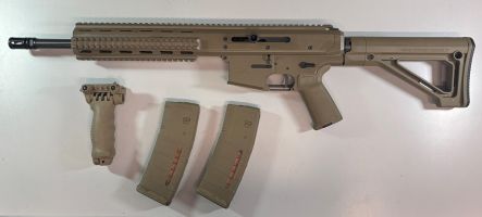 Warwick WFA1 .223 in excellent condition. Magpul furniture. 2 x 10 round mags and vert grip.