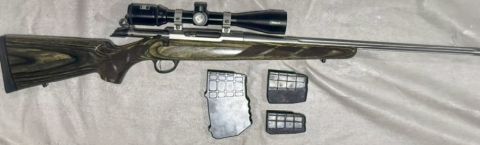 Tikka T3 in 308 WIN laminated stock, stainless and fluted barrel (not a normally available combination). Scope is a super clear Nikon Monarch 4 -16 x 42 BDC Ver