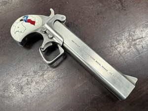 AMERICAN DERRINGER CORP
M-6
TEXAS MODEL 
45ACP
6" BARREL
STAINLESS STEEL
IVOREX GRIPS
#135968

UNFIRED $499