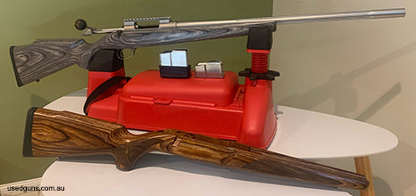 Sako 85M .243 stainless steel fluted, contessa scope Mount,a 5 and 10 round mag included, has a Boyd stock in grey laminate fitted and the original laminated st