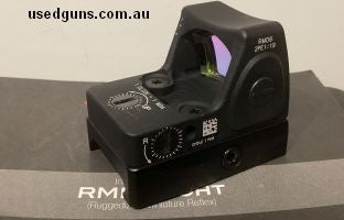 Near new Trijicon RMR red dot sight with 3.5 moa dot. With instruction manual in original protective case. More images available. Please email or text as often 