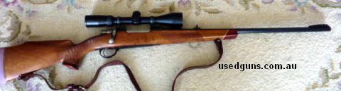 Bought new as a custom stocked/chequered rifle and hardly used. Unmarked wood, bluing and with an excellent barrel. Japanese Optics. Old age says no more huntin