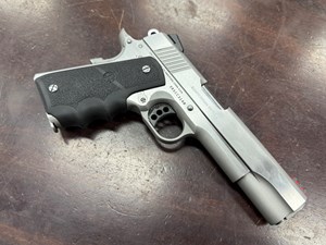 COLT 
1911 SS
GOVERNMENT MODEL
38 SUPER
9 SHOT
5 INCH NATIONAL MATCH BARREL
STAINLESS STEEL
HOGUE GRIPS
ADJUSTABLE REAR SIGHT
FIBER OPTIC FRONT SIGHT
#38SCC3148

EXC $990