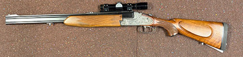Immaculate condition, action is tight, has an olf elupold scope on it , one small white mark on the stock which is pictured , has been fired , comes with 5 boxe