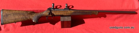Lovely timber stocked Sauer 100 in 7mm Rem Mag. Leupold 30mm rings. No marks at all.