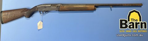 Winchester 1400 Cat C semi auto shotgun. Crimped to 2 shot capacity. Is in fair condition