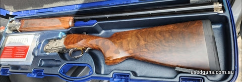 Beretta Silver Pigeon 3 20th anniversary I honestly bought the gun to take if I went hunting and never went it has had 1 pack of shells through it like new not 