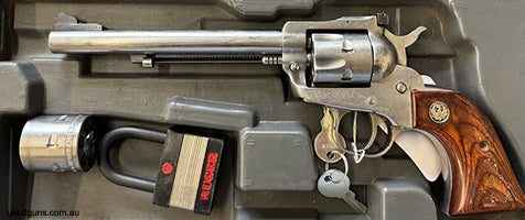 Ruger new model single six. Is in good condition with rub marks and grips have areas where the varnish has rubbed off. Refer to pictures. Cylinder lockup, Rotat