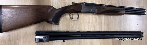 12G Akkar Shotgun, over/under with 2 barrel lengths all with chokes, fired approximately 20 shots, as new condition