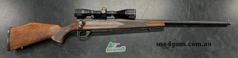 Weatherby Vanguard VGL 22-250 with Nikko 3-9x40 scope in fair condition.