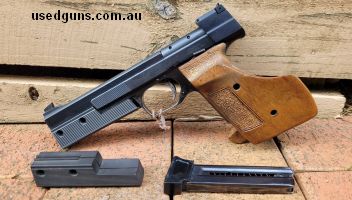 Hammerli International Model 208. Comes with original box, 1 magazine and spare barrel weight, front sights, firing pin, springs
