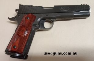 Very good Spartan has been fitted with an Ed Brown stainless steel barrel, mag well and trigger job comes with one magazine the price includes postage to your d