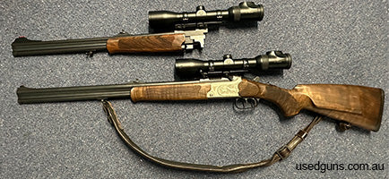 Merkel O/U double rifle in 5.6x50R mag with a 9.3x74R and second barrel 8x57R with 20G shotgun. With Merkel mounts for both barrels. Features game scene on both