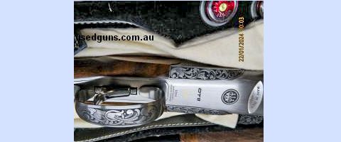 Magnificent DT11 Anniversary sporter with 32 " barrels , flat , hand filed tapered to rib , in its distinctive leather Beretta Anniversary case , over $25,000 w