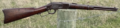 Original Winchester 1873 Saddle Ring Carbine manufactured in 1895. This rifle has seen some action and proudly shows its age. Plum/brown metalwork throughout. B
