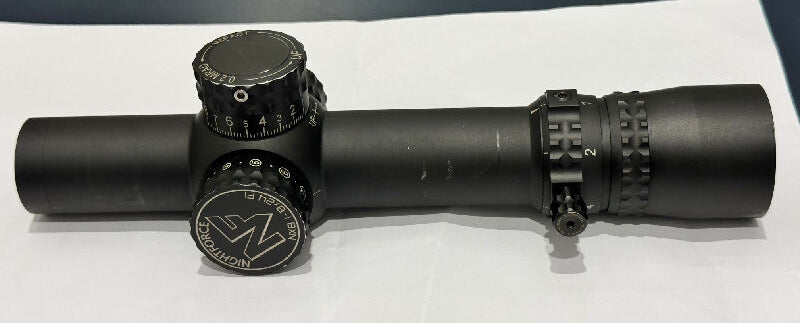 NX8 Low Power Variable Optic, FC-Mil reticle, mil turrets. Brilliant view, smooth turrets, accurate tracking. Objective lens is unmarked and ocular lens has sma