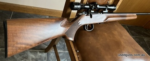 Excellent near new condition. Very little use. Metal work and bore as new. Bore been scoped. Semi heavy barrel with very nicely figured beaver tail walnut stock