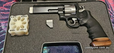 Smith & Wesson Proformance Center 627 V-Comp. Gun has all the Goods Extended cylinder release , Houge grip fitted and has had some very slick trigger work done.