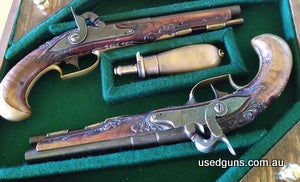 A fine and distinctive pair of German or Austrian percussion, travelling pistols originally made as flintlocks around 1780 or earlier. The .44 calibre, three st