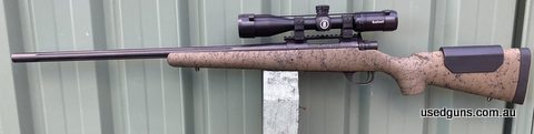 Howa 308W heavy fluted barrel. H-S Precision stock Bushnell 4.5-18x40 scope MDT rings. Cheek riser