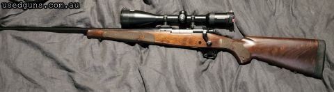 Last of New haven made left hand Winchester 300wsm beautiful tiger strip dark timber has been pillar bedded lovely gun that I want to keep just got another buil