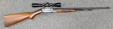 A FN Browning pump action Galley gun in 22LR in fair condition. This rifle was made in Belgium by FN. The rifle is in fair condition with light pitting on most 