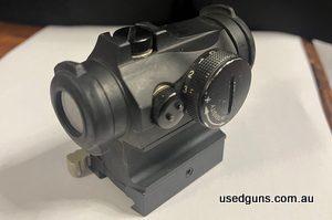 Aimpoint T2 2 moa Tactical red dot sight comes with high rise spacer, QD mount and protective lens covers.The T2 has lower brightness settings for use in low li