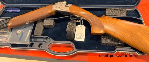 This gun is in as new condition. It shows no sign of being used. In its original case with all accessories including 5 chokes, key, etc.