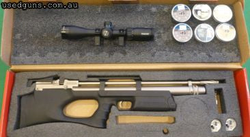 Excellent Condition, As New. Comes with scope, mounts and two magazines. Composite stock with marine finish.