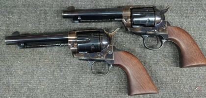 Pair of matching Pietta 1873 single action revolvers. Only marks are small marks on the grips and small marks on the chambers. Can send more photos on request. 