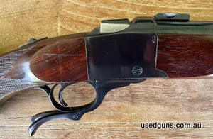 Early No 1 Varmint in tidy condition. Bore is very. Nice dark rich walnut as some of the early ones had and original pad. Some bumps and bruises, overall good a