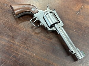 RUGER
SUPER BLACKHAWK
44 MAGNUM
6 SHOT
UNFLUTED CYLINDER
5.5 INCH STAINLESS STEEL
CUSTOM BARREL
FIBER OPTIC FRONT SIGHT
ADJUSTABLE REAR SIGHT
ORIGINAL RUGER TIMBER GRIPS
WITH EMBLEM
#87-11720

EXC $649