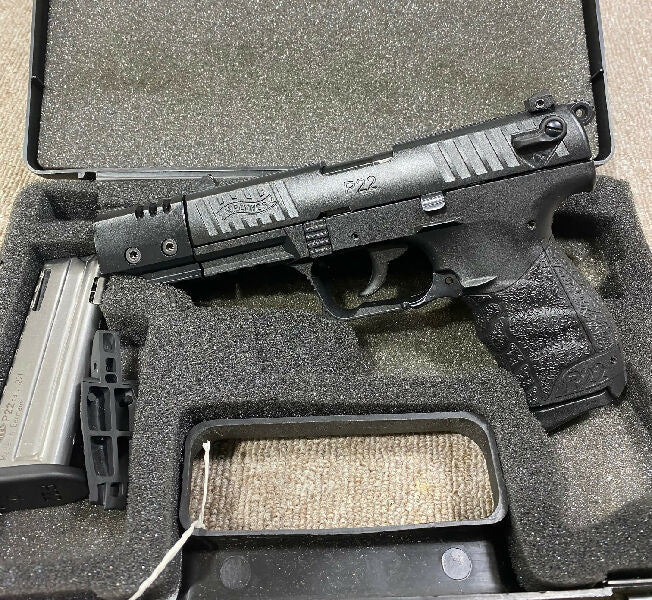Walther P22 .22 LR semi-auto pistol.  Cased. Spare mag. Second grip insert. Very nice condition showing little use. $50 post and transfer to dealer of choice.