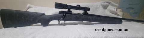 H-S precision stock, 22" sporter barrel, some wear on blueing and a couple of rub marks on fore end. Won't win gold at the fly shoot but good honest shooter.