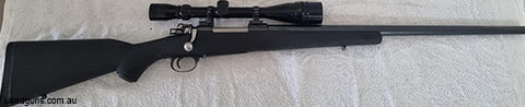 250 Savage built on a JP Sauer and Sohn Mauser 98 action. 24 in Varmint profile Sako barrel (stamped made in Finland) 1 in 14 twist Timney Trigger - Leupold bas