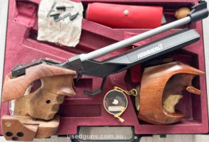 With RH Rink grip, new spare firing pin and spring, front and rear sight adjusters, grip, and original tools and carrycase. In excellent working condition.