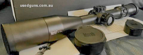 LNIB, premium March 3-24x52 FML-T1 illuminated riflescope. FFP, 30mm tube. Inc sunshade, fixed lens caps, pop open caps and all paperwork.