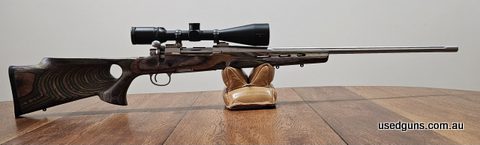 24 inch stainless fluted barrel. Boyds Featherweight Thumbhole stock (Forest Camo pattern). Leupold STD rings and mounts. Scope is in excellent condition. Fired